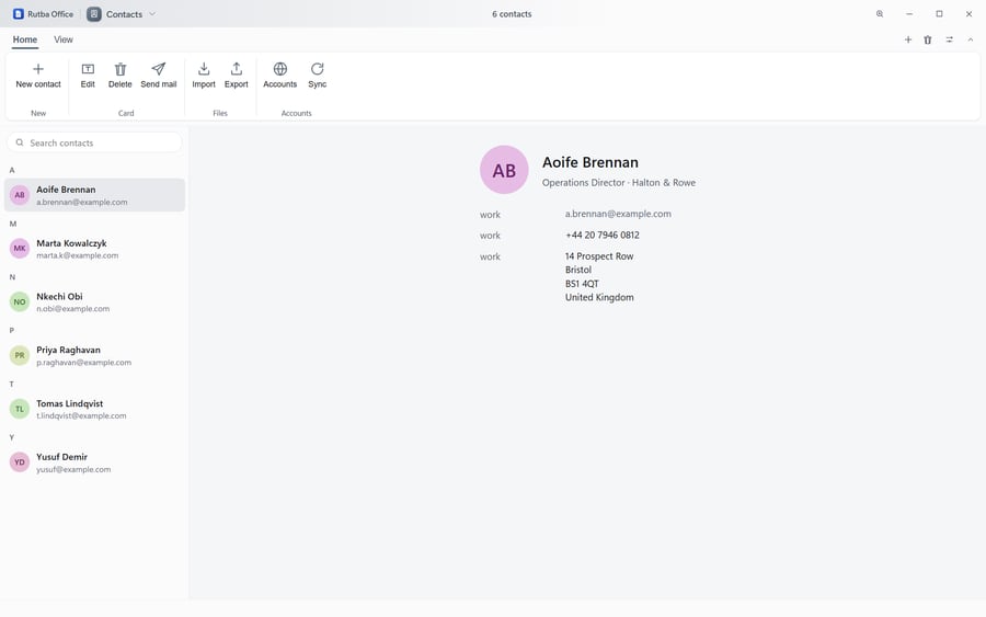 The Contacts app with an address book listed on the left and the card of Aoife Brennan open on the right, giving her job title, company, work email, telephone number and postal address